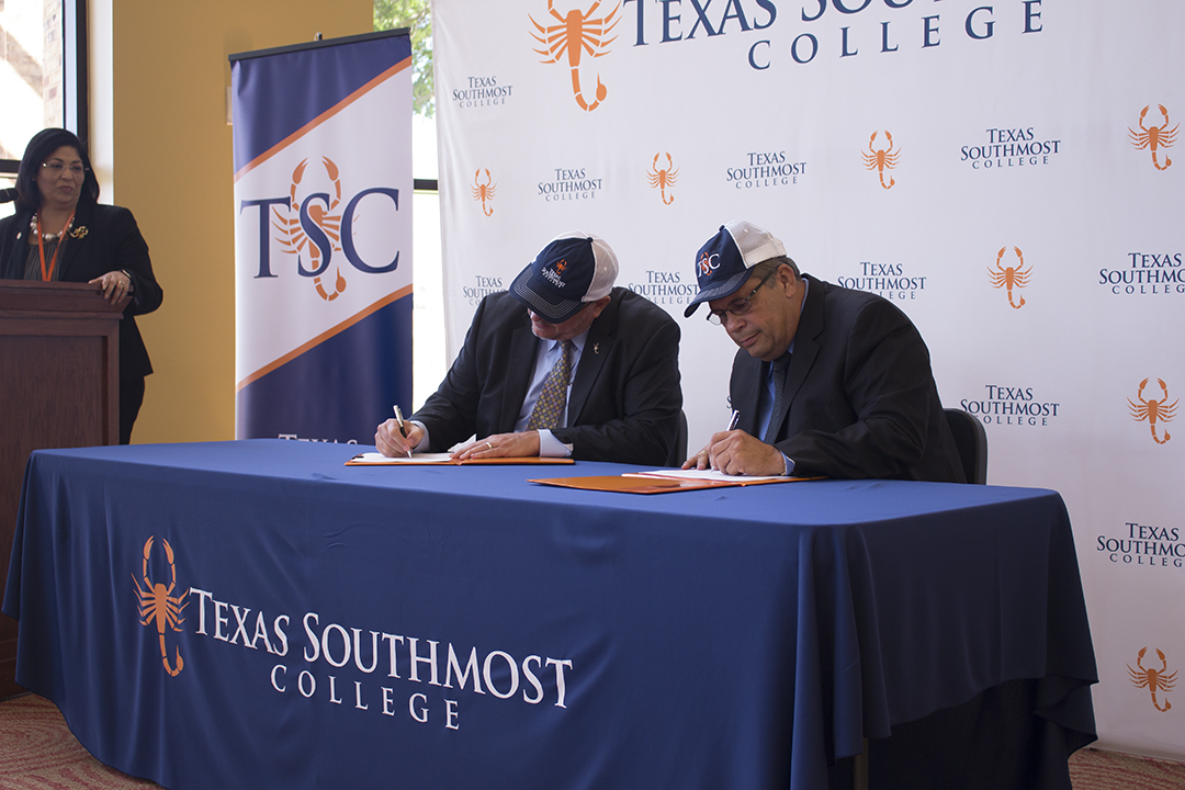 TSC Interim President Mike Shannon and City of Brownsville City Manager Charlie Cabler sign a Memorandum of Understanding at the TSC Arts Center.
