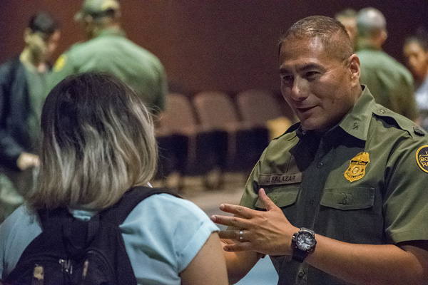 A Customs & Border Patrol agent talks to a Texas Southmost College Student after the Scorpion Lecture Series on Careers in CBP concluded on Sept. 27, 2017 at the TSC SET-B Lecture Hall.