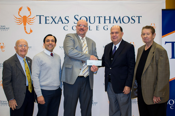 The Mexican Consulate presented an IME Becas grant to Texas Southmost College on Dec. 20, 2016 at the TSC Arts Center Gold Hall in Brownsville, Texas. From left, TSC Board of Trustees member Dr. Reynaldo GarcÃ­a, TSC Board of Trustees Vice Chair Trey Mendez III, TSC Interim President Mike Shannon, Mexican Consul Juan Carlos CuÃ© Vega and TSC Board of Trustees member RamÃ³n Hinojosa Champion.