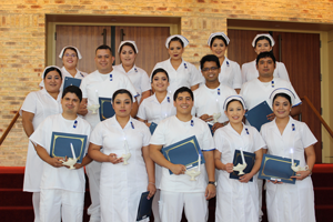 Texas Southmost College Licensed Vocational Nurse (LVN) graduates pose together on Aug. 13, 2016 at the TSC Arts Center in Brownsville.