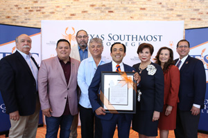 The TSC Board of Trustees honored Board Chair and City of Brownsville Mayor Elect, Trey Mendez, with a resolution during the June 27, 2019 regular meeting. From left, TSC Trustee Art Rendon, Trustee J.J. De Leon Jr., Trustee Tony Zavaleta, Ph.D., TSC Board Secretary Ruben Herrera, TSC Board Vice Chair Trey Mendez, TSC Board Chair Adela G. Garza, Trustee Eva Alejandro, and TSC President Jesús Roberto RodrÃguez, Ph.D.