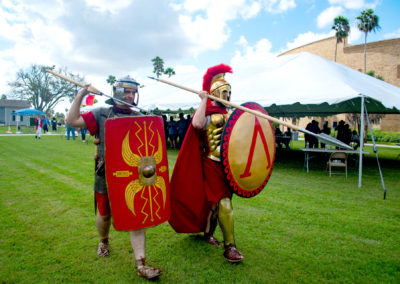 Dirk Yarker, Texas Southmost College History Professor and co-organizer of Living History Day, strikes a pose while adorned in replica ancient Roman armor and armaments.
