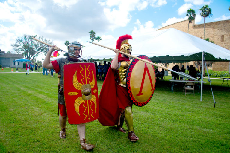 Dirk Yarker, Texas Southmost College History Professor and co-organizer of Living History Day, strikes a pose while adorned in replica ancient Roman armor and armaments.