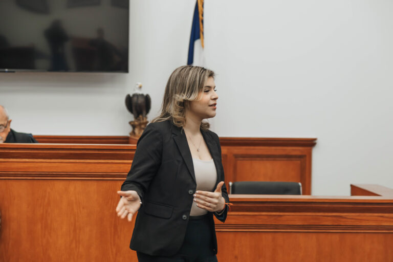 Diana S. Martin, a TSC Criminal Justice student acting as a prosecutor, cross-examines Irma Campo, who plays the defendant, during a mock trial at the newly opened TSC Legal Center Courtroom at Texas Southmost College on April 24, 2024.