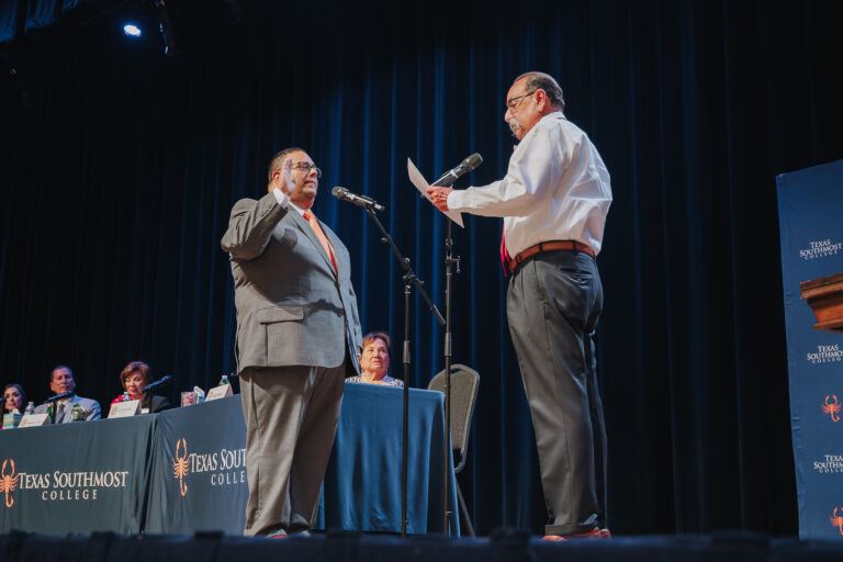 Edward C. Camarillo raises his hand to take the Oath of Office, as administered by Cameron County District Attorney Luis Saenz, on Wednesday, June 26, 2024 at the Jacob Brown Auditorium.