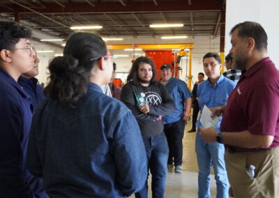 Michael Sandoval of DFG Solutions fields questions from curious students after a tour of the training facilities.