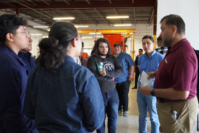 Michael Sandoval of DFG Solutions fields questions from curious students after a tour of the training facilities.