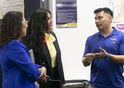 Dr. Prisci Roca Tipton, Director of Special Instructional Projects at Texas Southmost College, visits with staff at Besteiro Middle School as part of Principal for a Day on Thursday, February 6. 2025.
