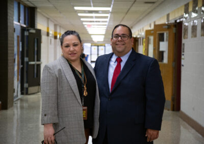 TSC Board Trustee Edward Camarillo, M.P.P.M., poses for a photo with Vela Middle School Principal Michelle Garcia.