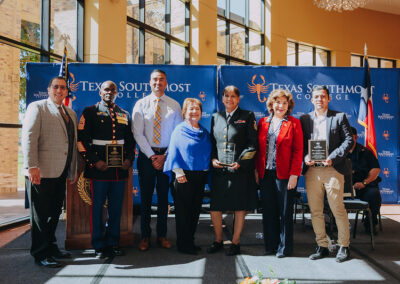 Texas Southmost College administration and local veterans in a group photo.