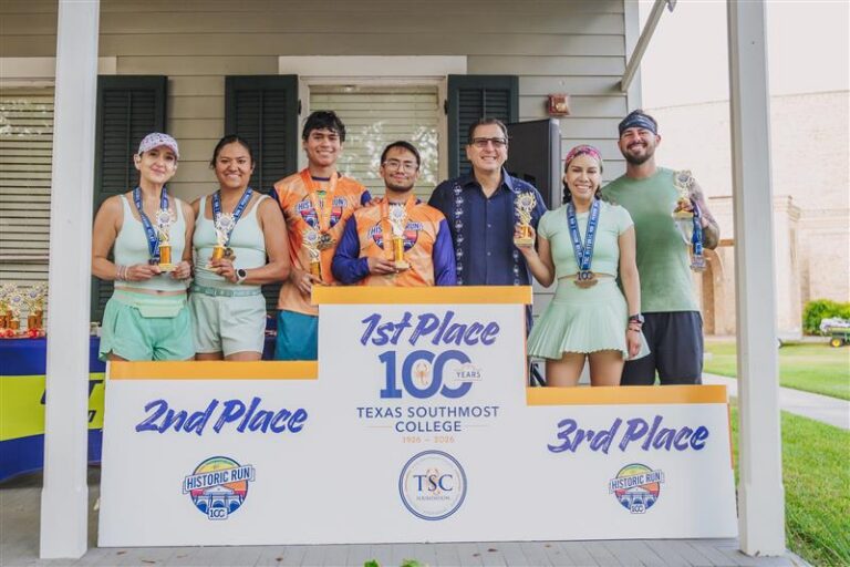 TSC President Dr. Jesus Roberto Rodriguez joined at the podium by the top three teams who ran the TSC Half Marathon. Brian Aranda and Luis Aranda won took first place.