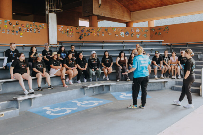 TSC students observe a sea turtle rehabilitation area during a guided tour at Sea Turtle, Inc.