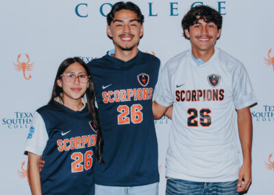 Lopez Early College High School soccer players Nataly Palomino, Esteban Juarez and Erik Coronado sign letters of intent with TSC at a ceremony held at Lopez ECHS.