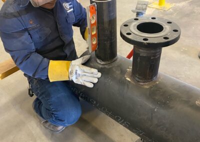 TSC Pipefitting Program instructors and students working in the pipefitting shop.