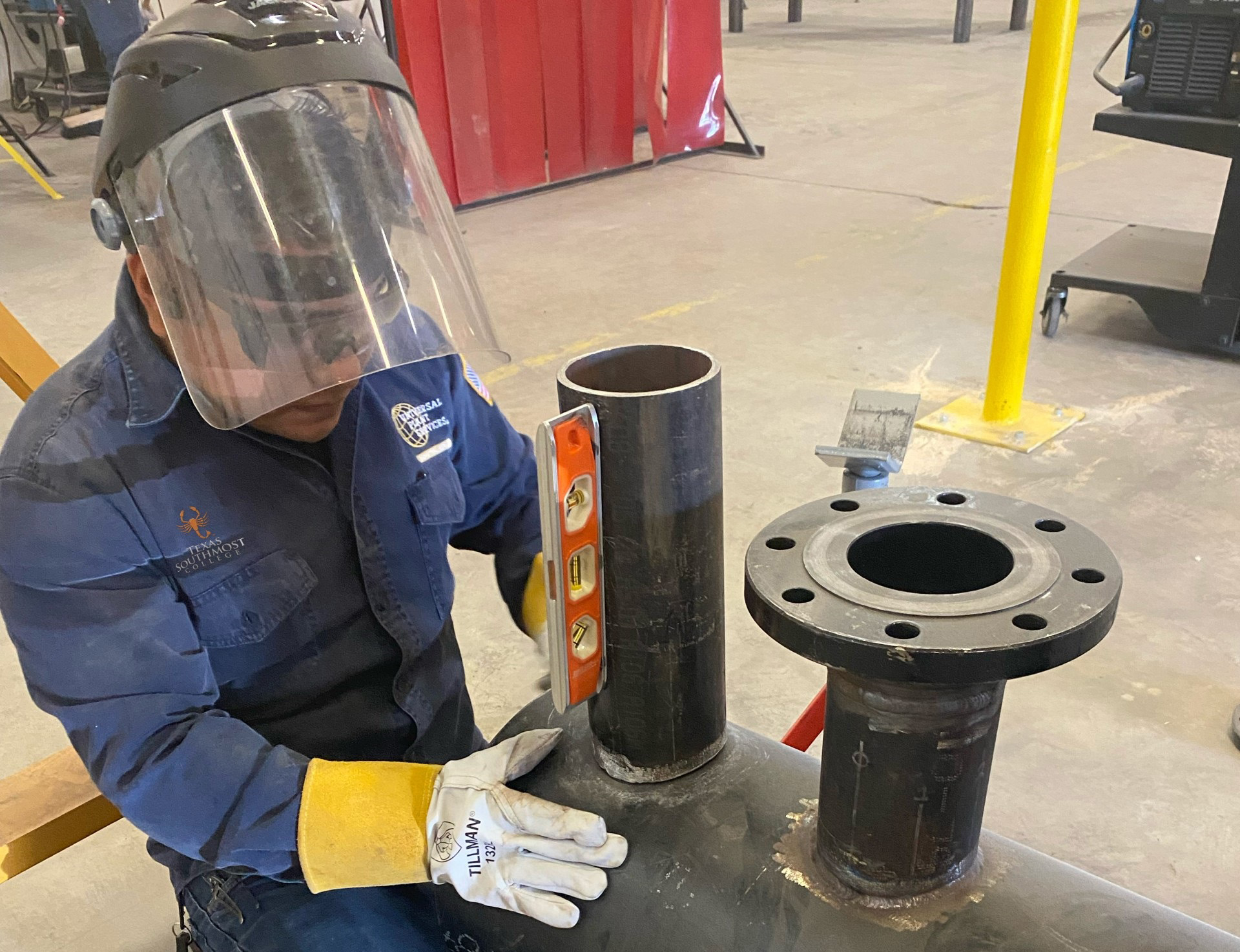TSC Pipefitting Program instructors and students working in the pipefitting shop.
