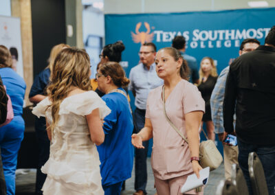 Cynthia Diaz, lead instructor for the TSC Medical Aesthetics Injector Certificate program, speaks with a prospective student interested in learning more about the program during the Medical Aesthetics Information Session on July 30, 2026, at the ITEC Center.