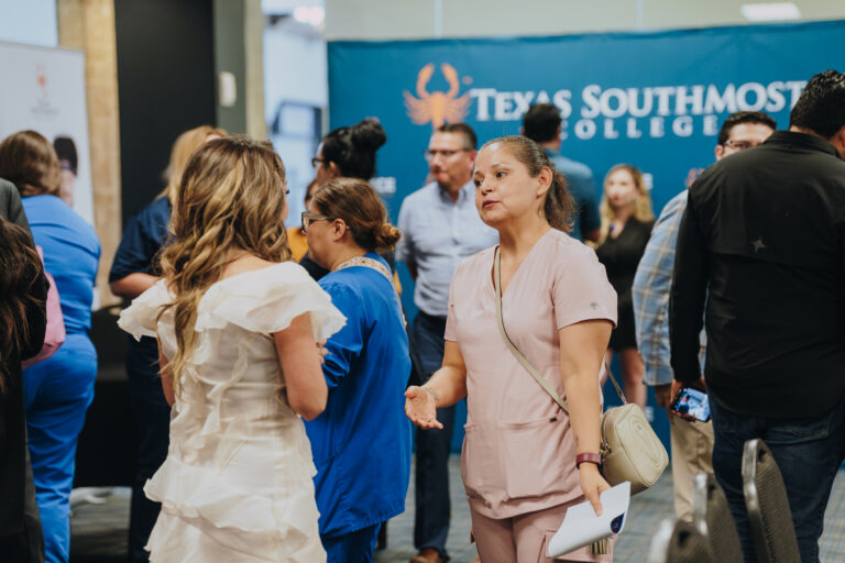 Cynthia Diaz, lead instructor for the TSC Medical Aesthetics Injector Certificate program, speaks with a prospective student interested in learning more about the program during the Medical Aesthetics Information Session on July 30, 2026, at the ITEC Center.