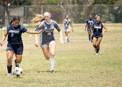 Texas Southmost College’s Mia Saenz (8) moves the ball past a Northeast Texas Community College defender during the Scorpions’ 2-1 victory at TSC Scorpion Soccer Field in Brownsville, Texas. Saenz scored the opening goal for TSC.
