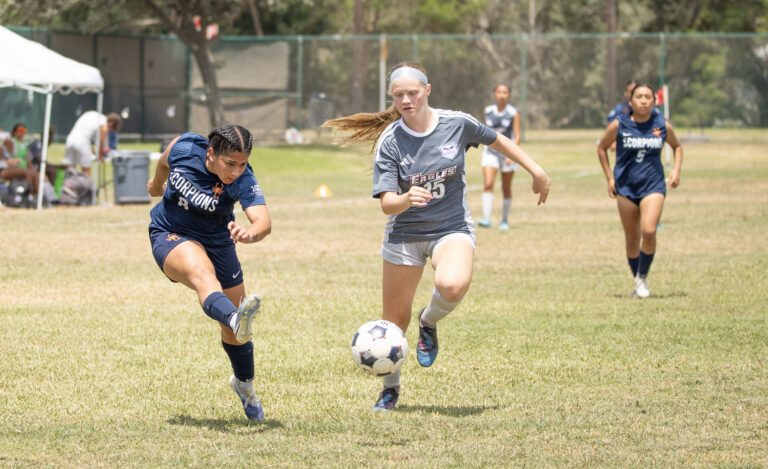Texas Southmost College’s Mia Saenz (8) moves the ball past a Northeast Texas Community College defender during the Scorpions’ 2-1 victory at TSC Scorpion Soccer Field in Brownsville, Texas. Saenz scored the opening goal for TSC.