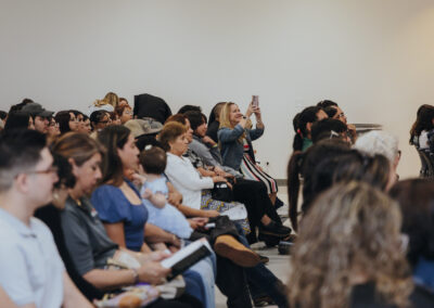 Guests watch contributors featured in Scorpion’s Quill, Issue 2, present their work during a showcase for the literary and arts journal on April 22, 2026, at the Oliveira Student Services Center.