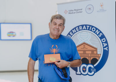 A guest displays a Texas Southmost College identification badge from his student days during Generations Day on Sept. 14, 2026, at the Oliveira Student Services Center. The event celebrated the college’s century-long legacy and its impact on generations of students and families as part of TSC’s yearlong Centennial Celebration.
