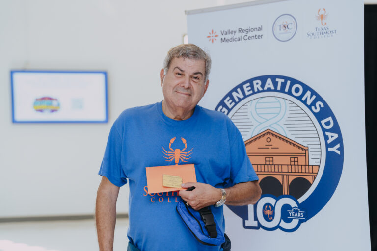 A guest displays a Texas Southmost College identification badge from his student days during Generations Day on Sept. 14, 2026, at the Oliveira Student Services Center. The event celebrated the college’s century-long legacy and its impact on generations of students and families as part of TSC’s yearlong Centennial Celebration.