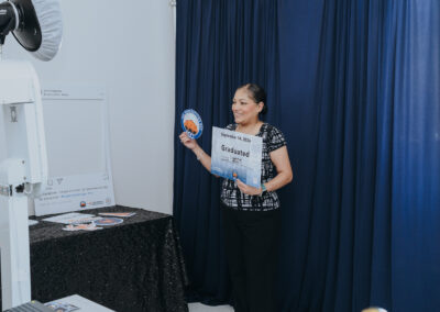 A guest takes a commemorative photo during Texas Southmost College’s Generations Day on Sept. 14, 2026, at the Oliveira Student Services Center.