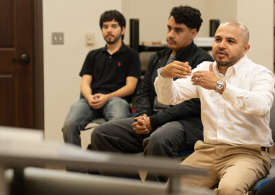 TSC Architecture instructor Martin Jaramillo discusses a project with a student presenter during a classroom critique.