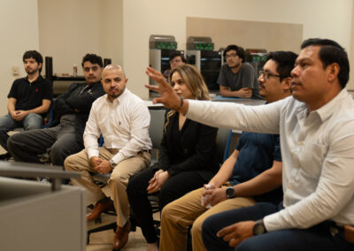 TSC Architecture instructor Martin Jaramillo joins colleagues and students during a classroom critique.