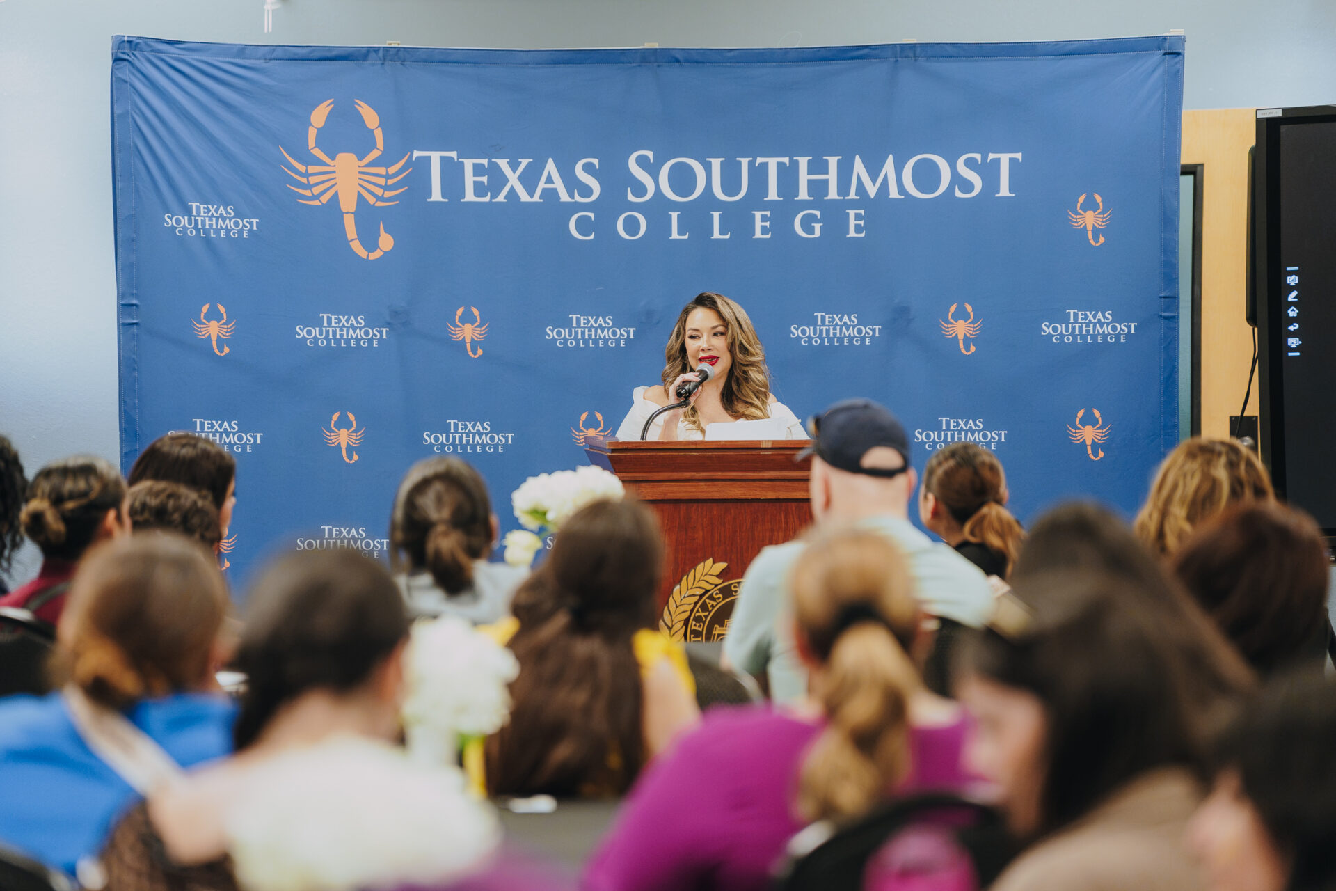 Cynthia Diaz, lead instructor for the TSC Medical Aesthetics Injector Certificate program, addresses guests and prospective students during the Medical Aesthetics Information Session on July 30, 2026, at the ITEC Center.