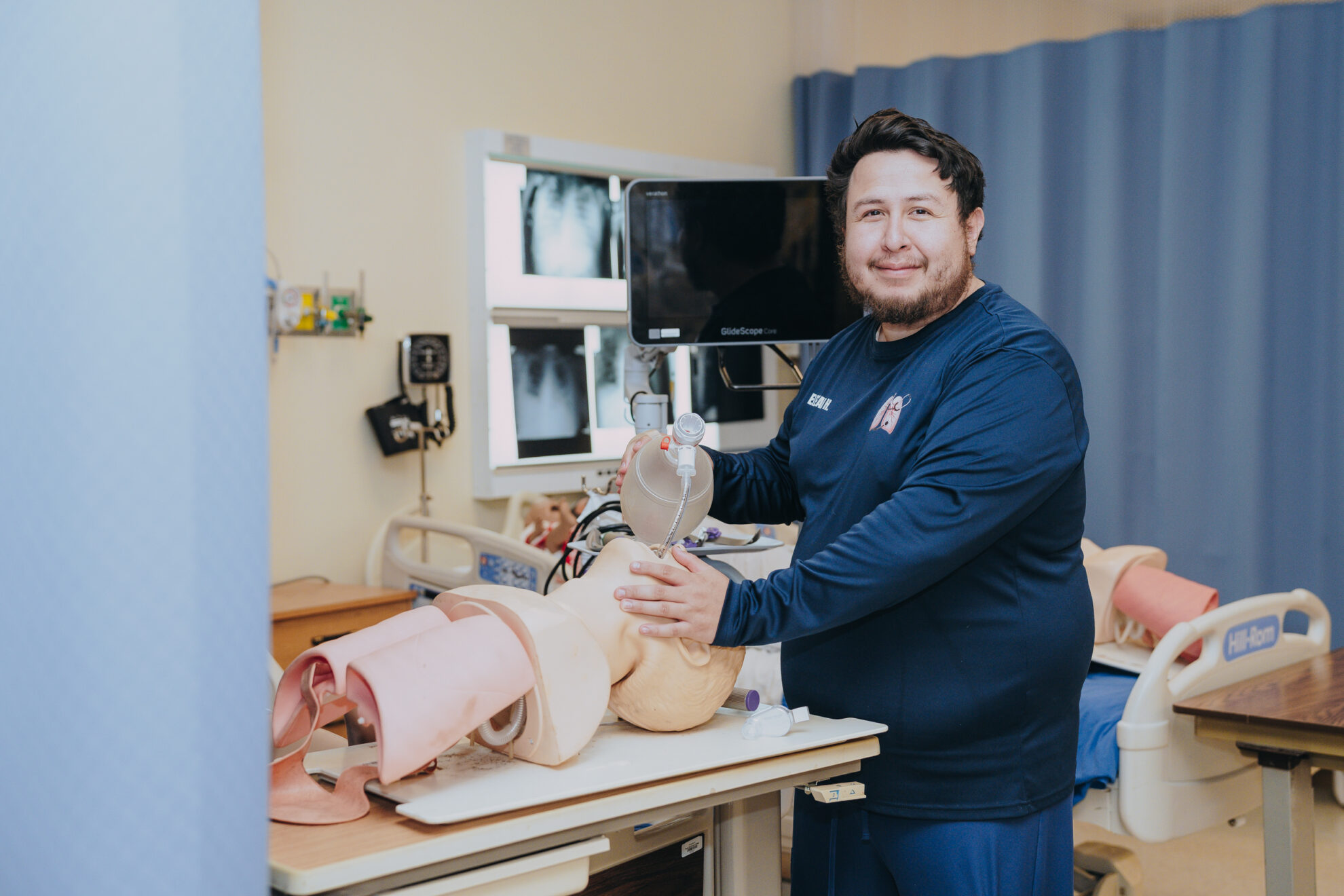 Eleazar Hernandez poses for a photo in a respiratory care lab at Texas Southmost College. In August 2026, Hernandez received the 2026 Neil Allen Memorial Grant, a $3,500 award presented by the Respiratory Care Foundation of Texas. Hernandez was recognized for his academic and research achievements in respiratory care.