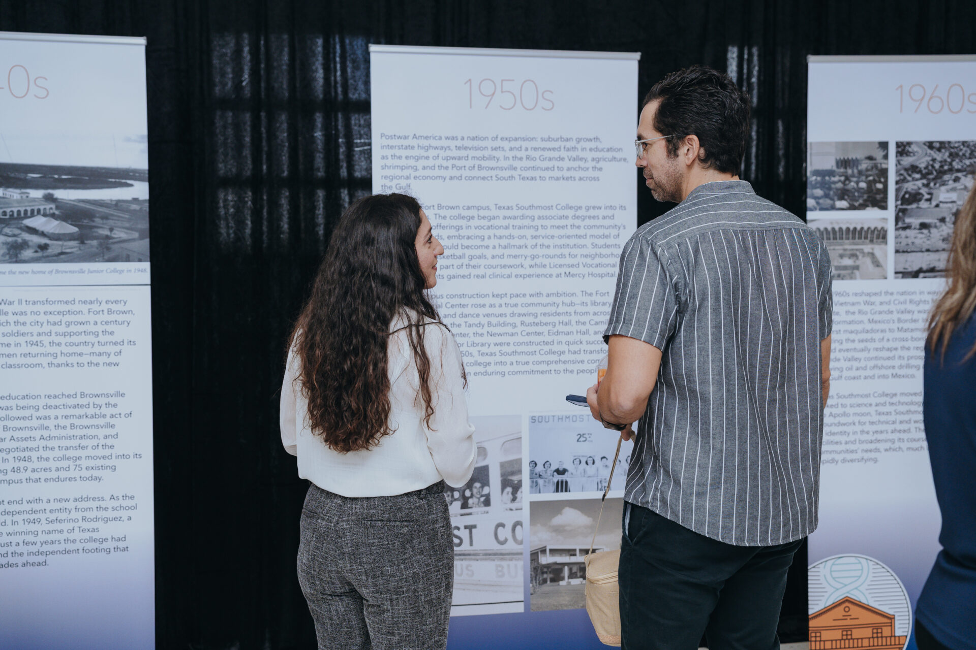 Guests view an exhibit highlighting key moments in Texas Southmost College's history during Generations Day on Sept. 14, 2026, at the Oliveira Student Services Center.